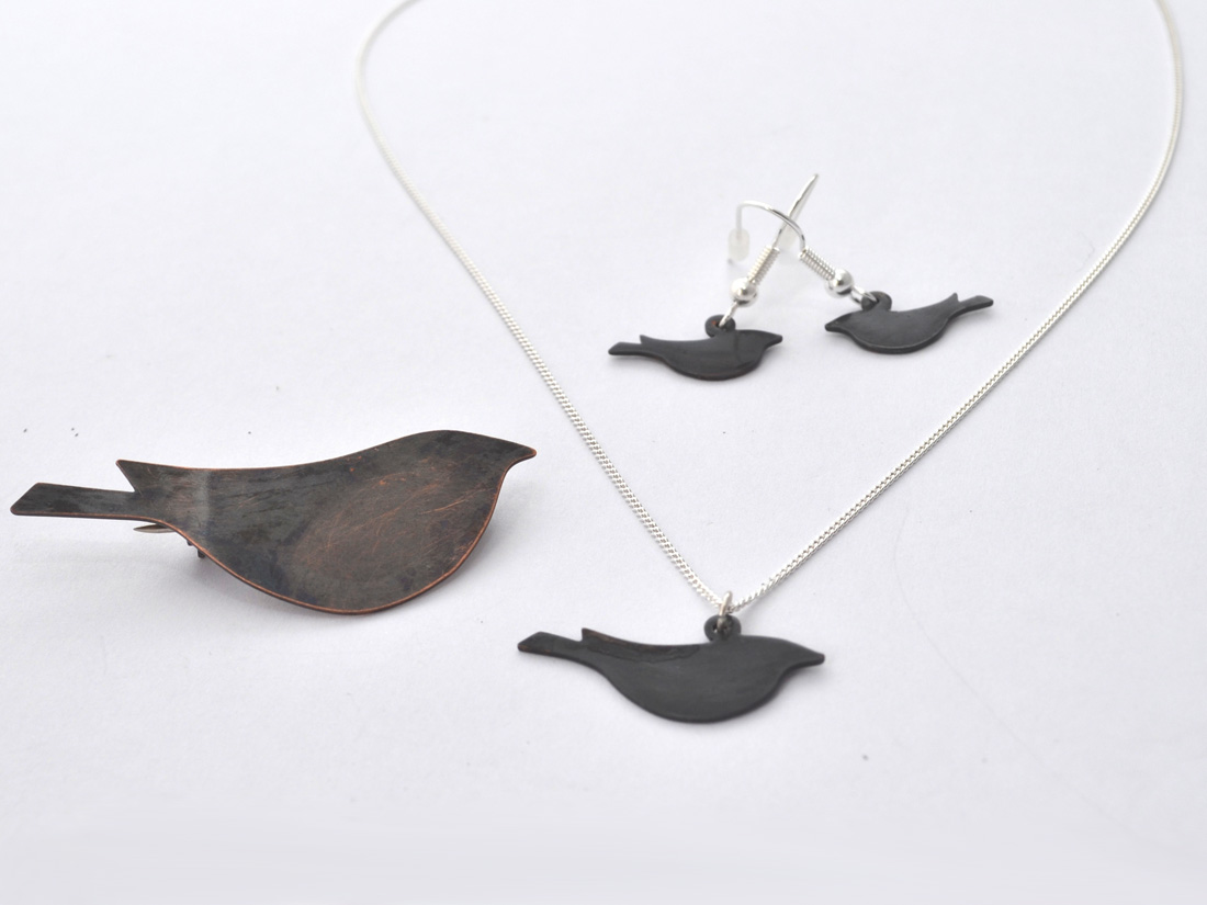 Oxidised metal bird brooch, necklace and earrings