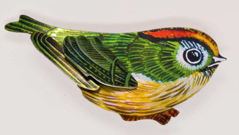 A small bird printed with a bright design of a goldcrest.