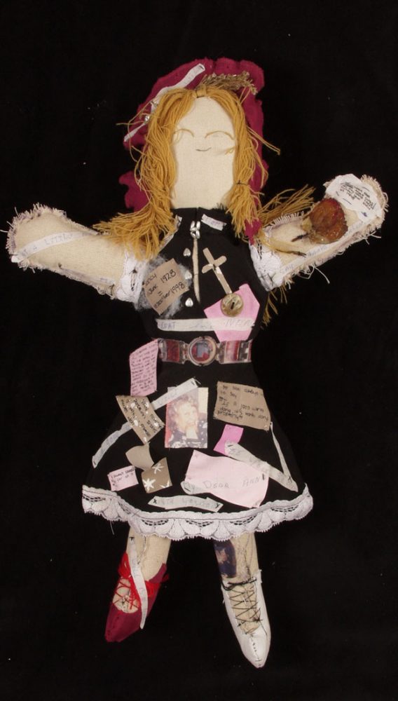 A series of pictures and memories stitched in to a textile doll.