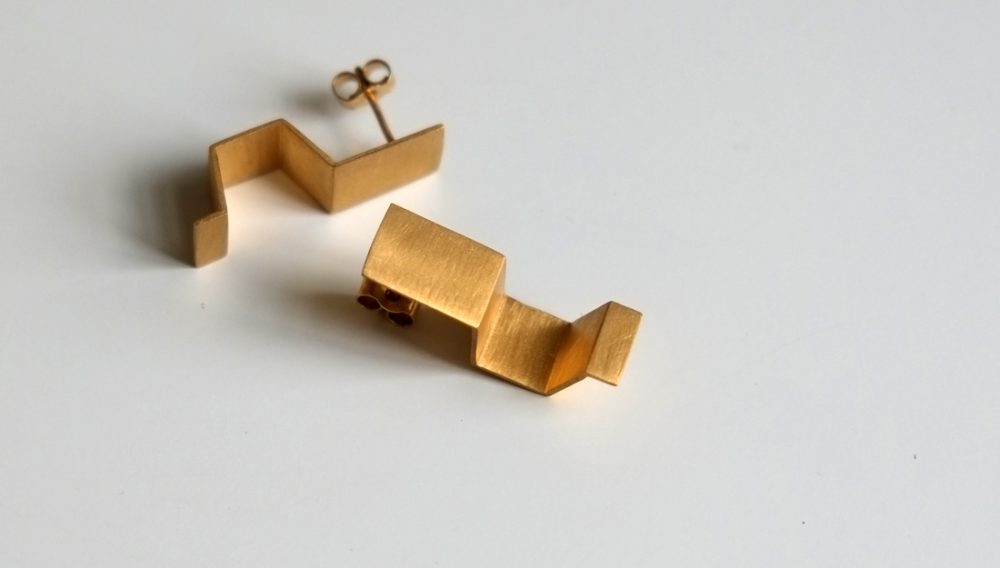 Shelanu Interlocking Stories earrings in gold. Simple in design.