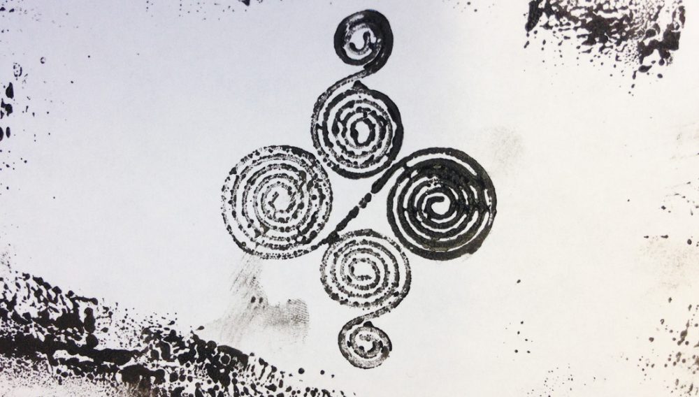 A swirl design printed using ink.