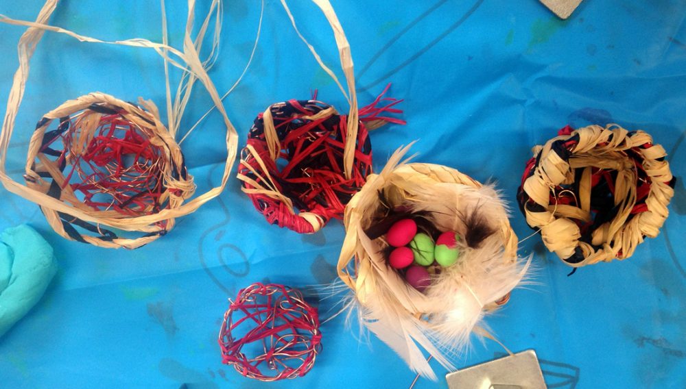 5 nests made using paper, copper wire and feathers.