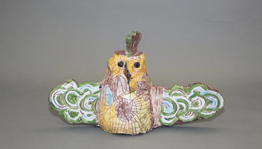 ceramic bird sculpture