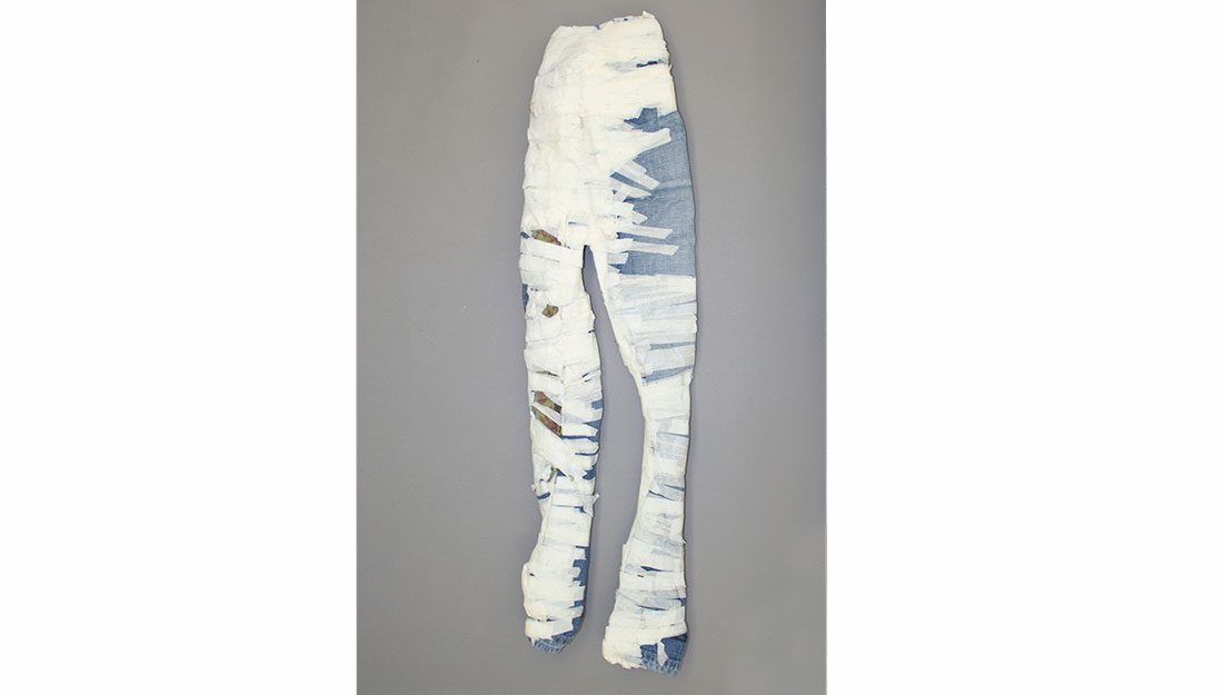 jeans with masking tape wrapped around them