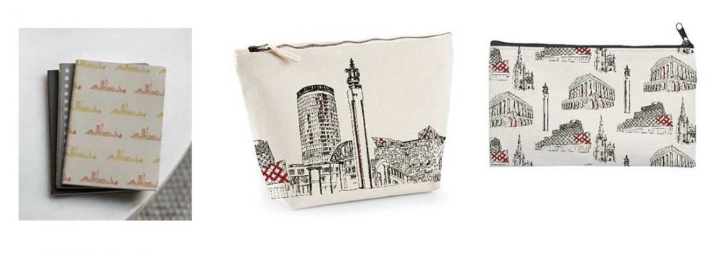 A notebook, washbag and purse decorated with drawings of birmingham architecture.