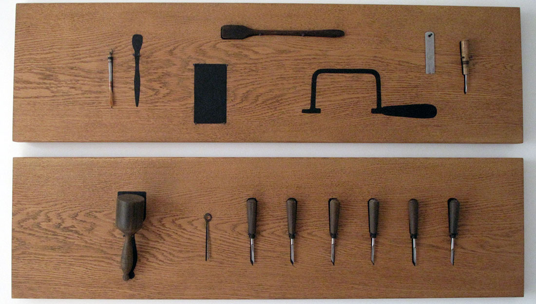 A tool shadowboard, with handmade tools.