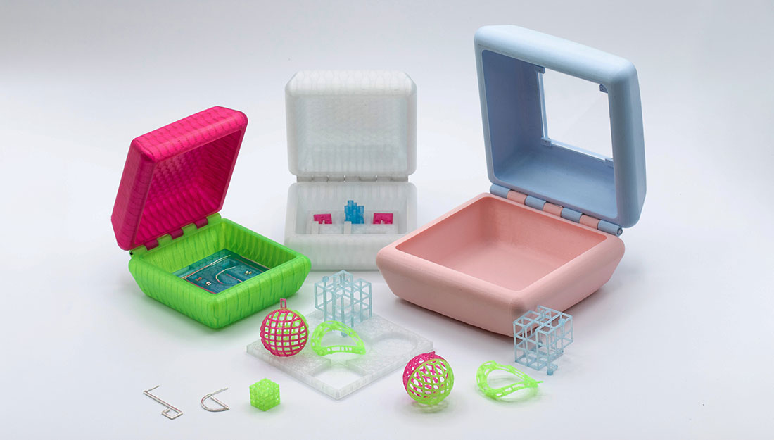 Some 3D printed boxes with geometric jewellery.