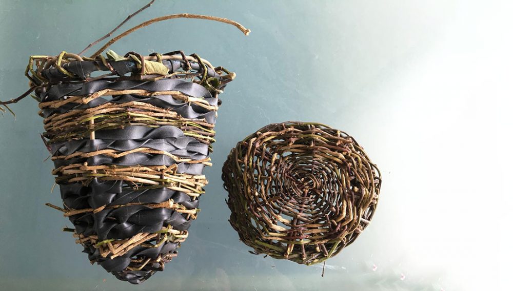 Two roughly woven baskets.
