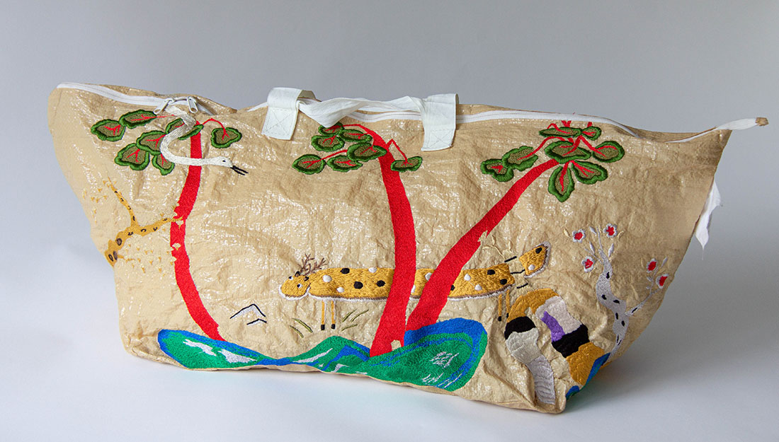 A large embroidered bag.
