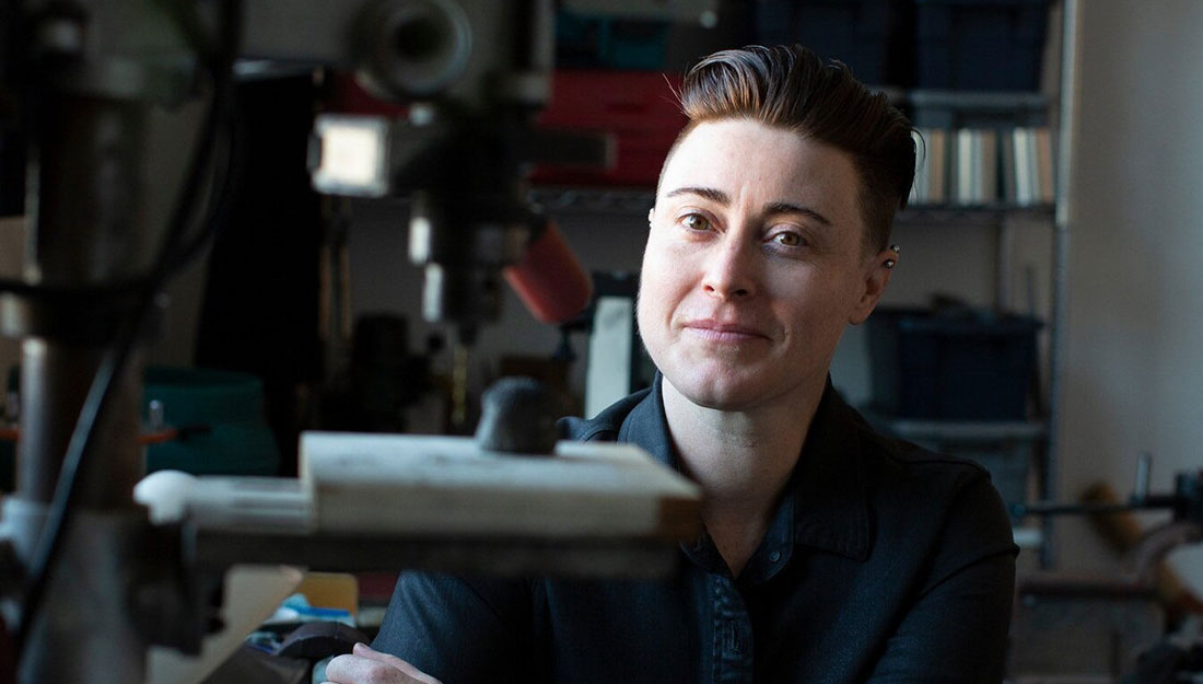 A portrait of the artist in her studio.