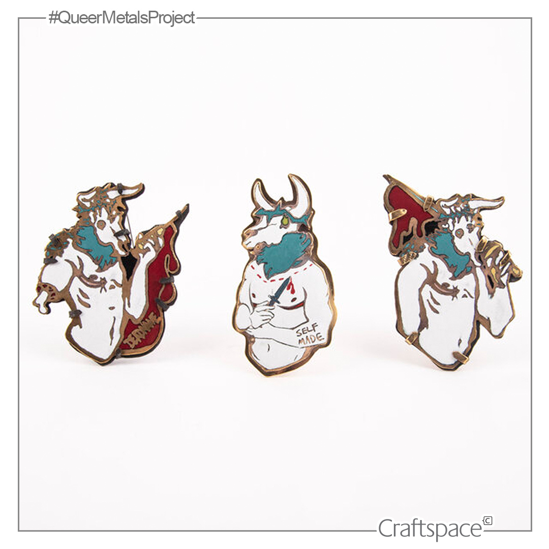 Three enamel figures of white and blue mythical minotaurs, truncated at the waist, each hold a different item.