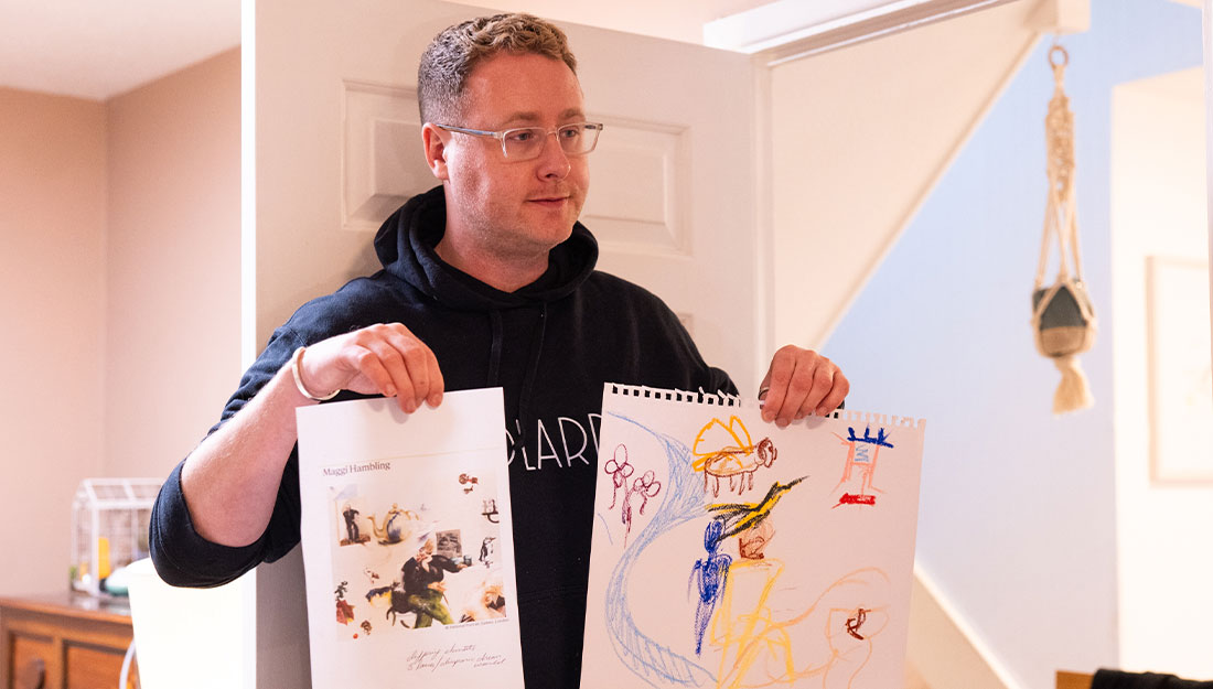 CraftingPathways_Abigail&Oly_PhotoHayleySalter_1100x625_4 Oliver holding up a printed copy of Maggi Hambling's self portrait and a sketch of Abigail's, side by side.